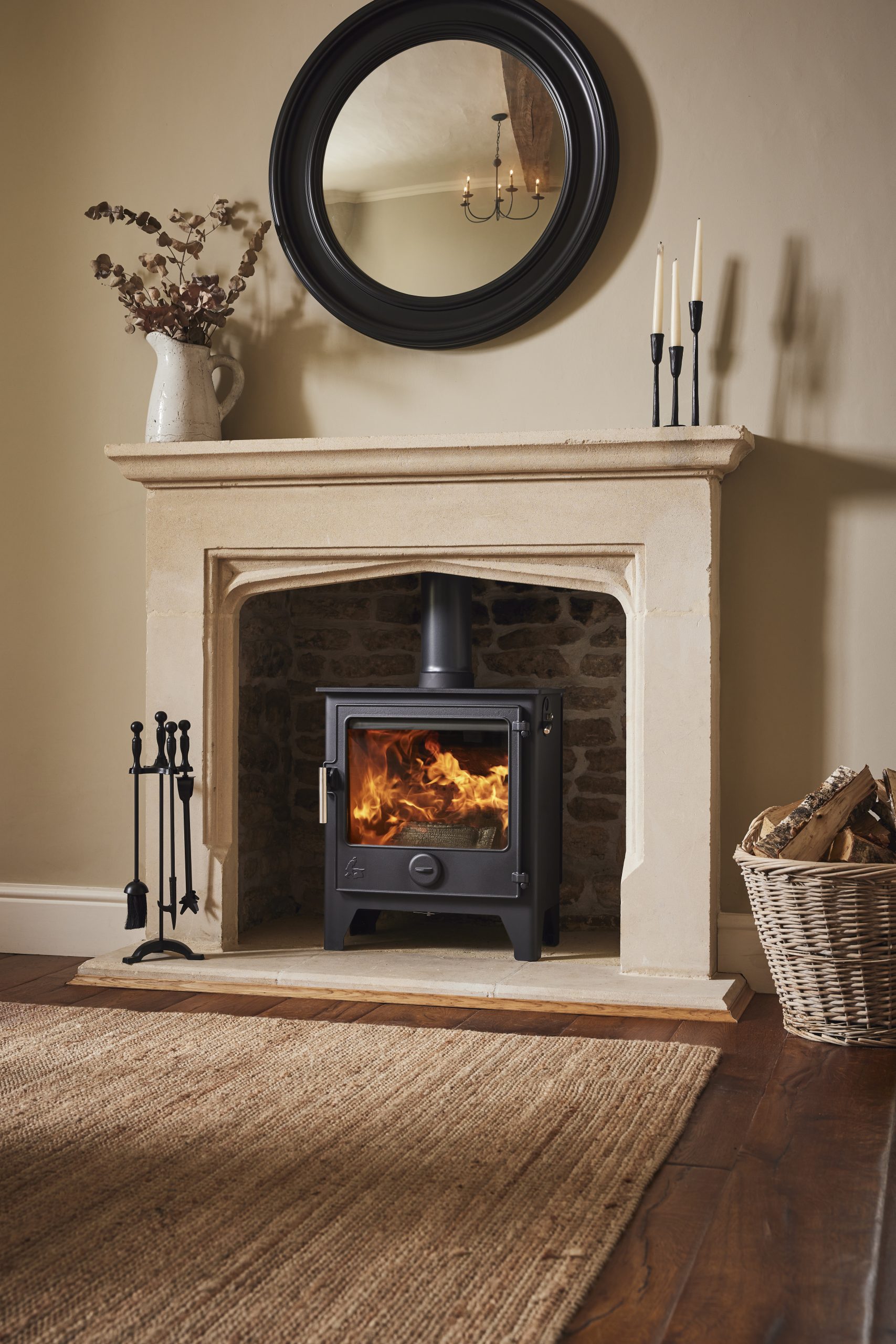 Dean Forge chrome multi-fuel stove installed in Cornwall with flue and stone hearth