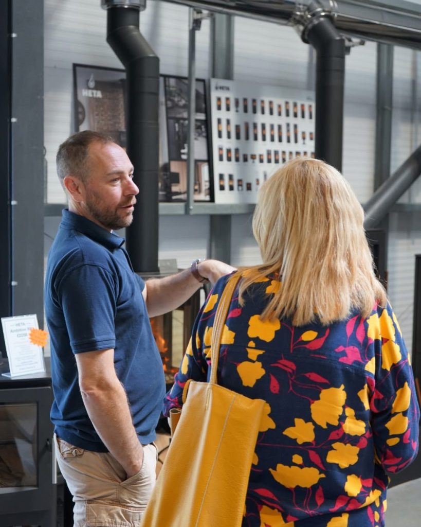 Friendly customer consultation for stove installation services in Cornwall
