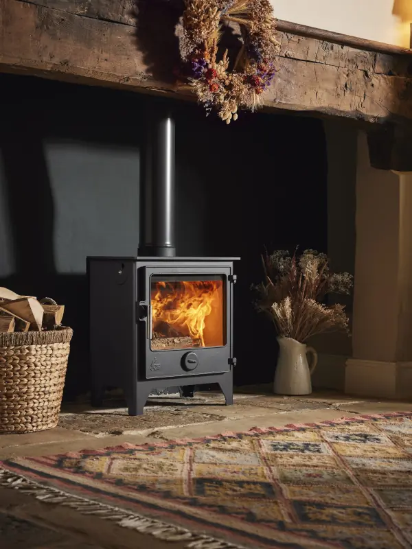 Woodburning and multifuel stoves installed in a traditional Cornwall fireplace