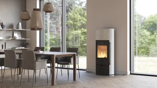 Gas fire with decorative stone surround and hearth installed in a Cornwall property