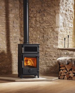 Dartmoor Baker 5 black stove with stainless steel handles in Cornwall home