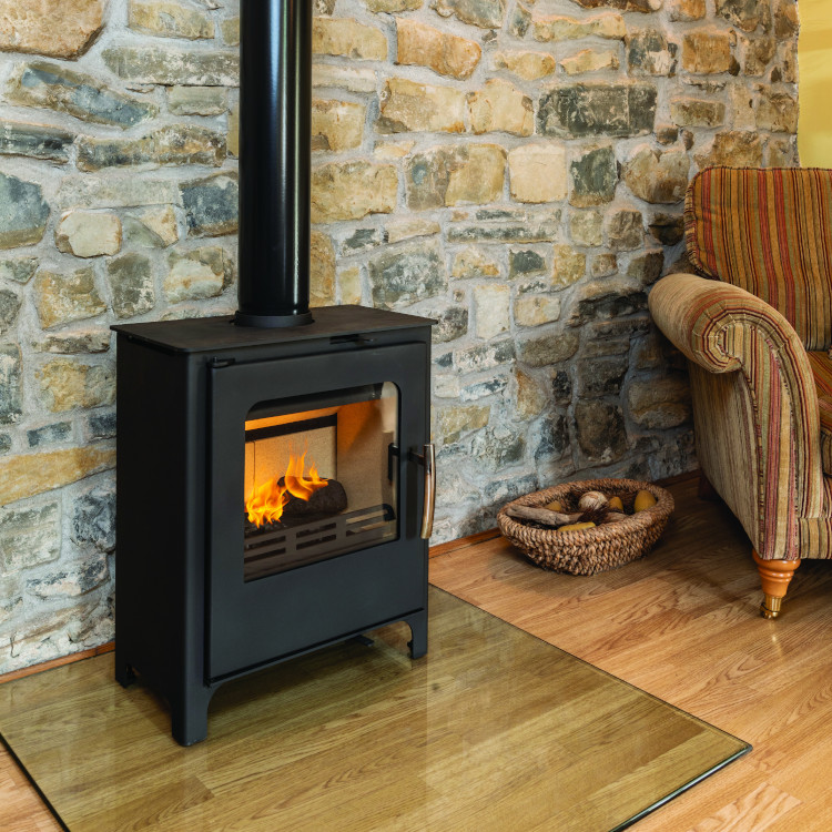 Contemporary Lotus multi-fuel stove fitted with twin-wall flue system in Southwest England