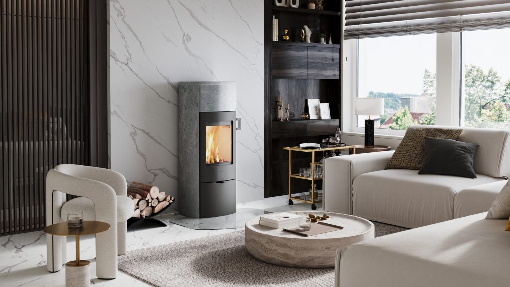 Mondo M soapstone stove with stone surround and hearth in a Cornwall living room