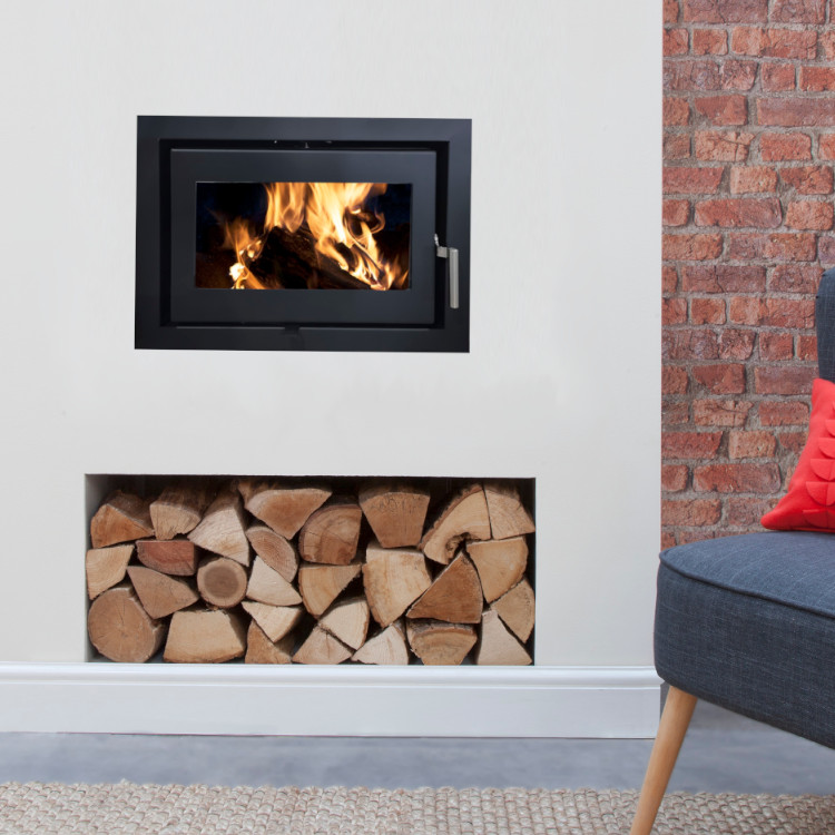 Electric fire with realistic flame effect installed in a Southwest England lounge with stone surround