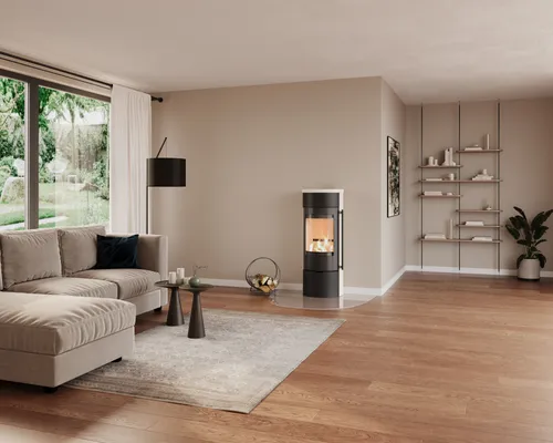 Modern multi-fuel stove installed in a Cornwall home with stone hearth and surround