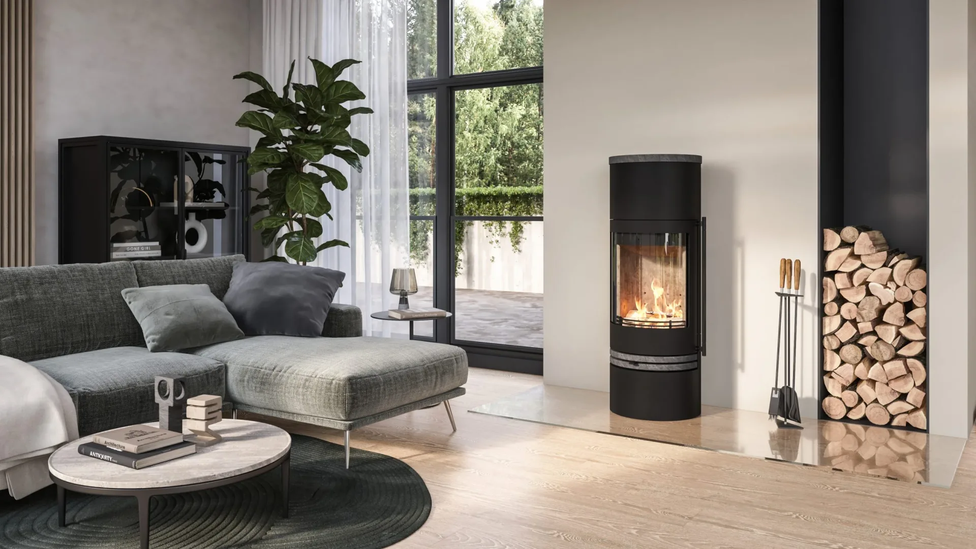 Tall black contemporary wood burning stove with curved glass door burning in modern living room with log store